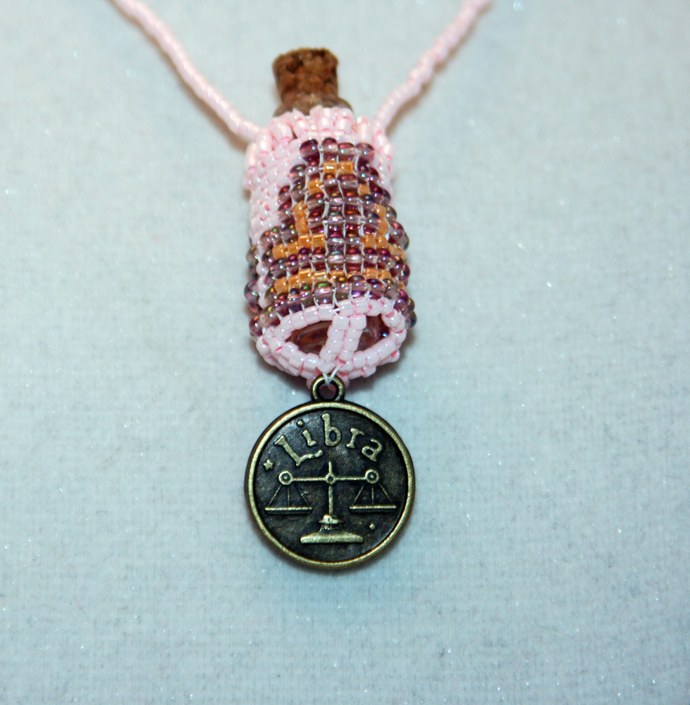 Beaded Bottle Necklace in Purple, Orange, and Pink with Zodiac Medallion